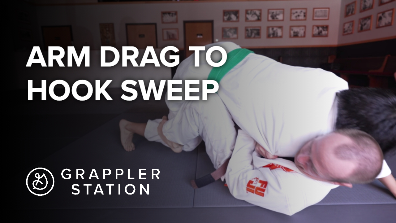 Seated Arm Drag to Hook Sweep Grappler Station